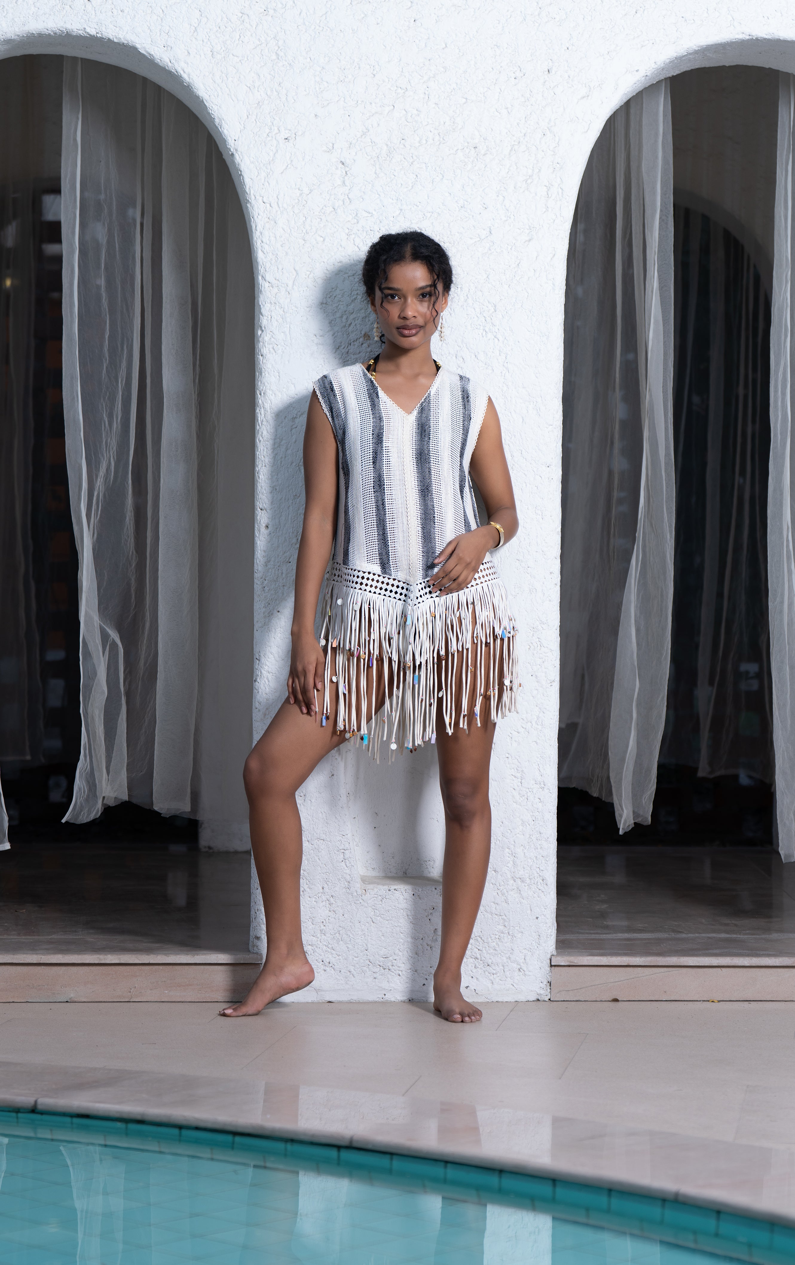 Braided tassel with embellishment top
